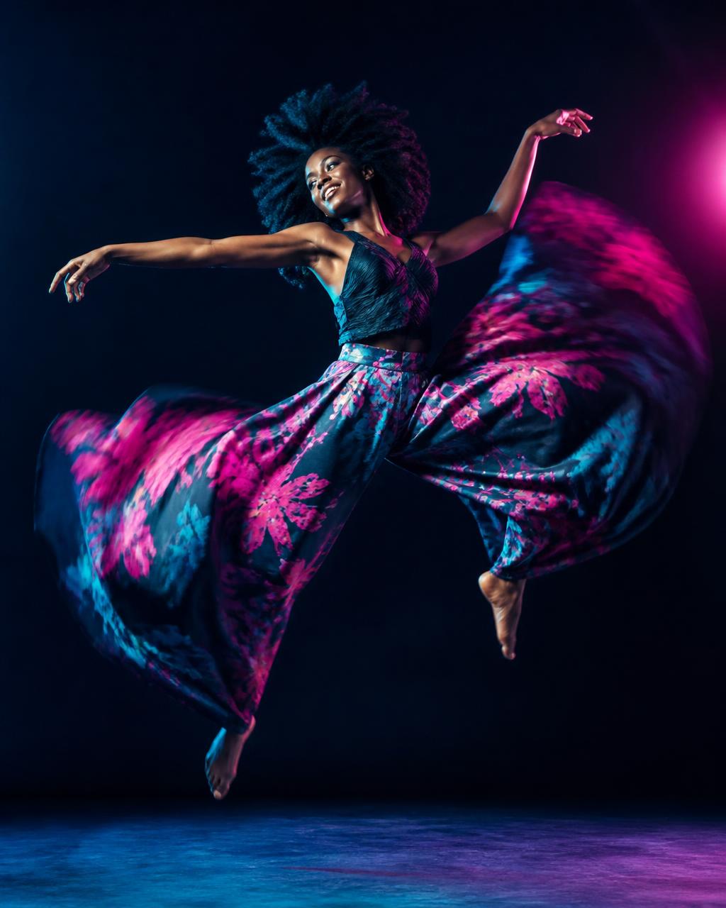 Woman dancing in dramatic flowing statement pants